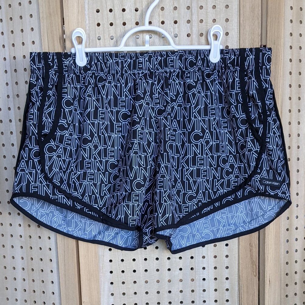 Calvin Klein running shorts with liner, pockets and interior drawstring